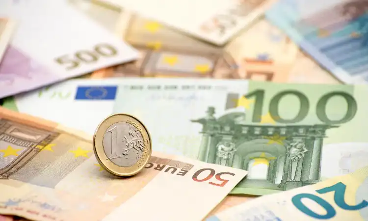 Notas e moeda de Euro
